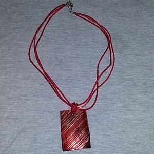 Red beaded redgokd rectangle medallion necklace